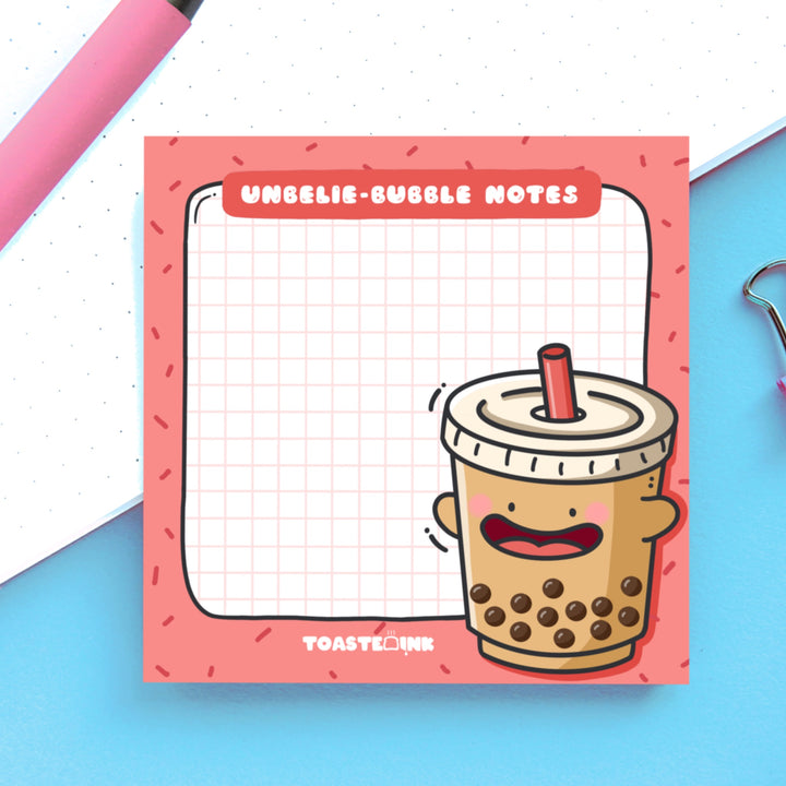 Bubble tea sticky notes on blue and white table