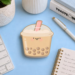Bubble tea sticky notes on blue desk 