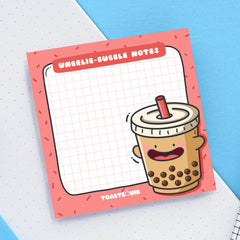 Bubble tea sticky notes on blue and white table