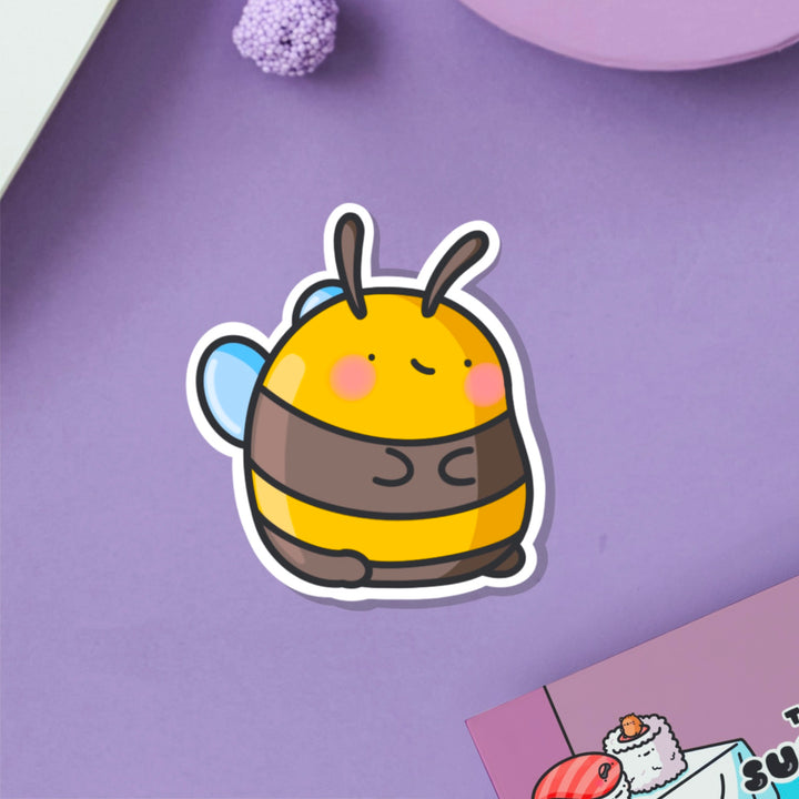 bumblebee vinyl sticker on purple table