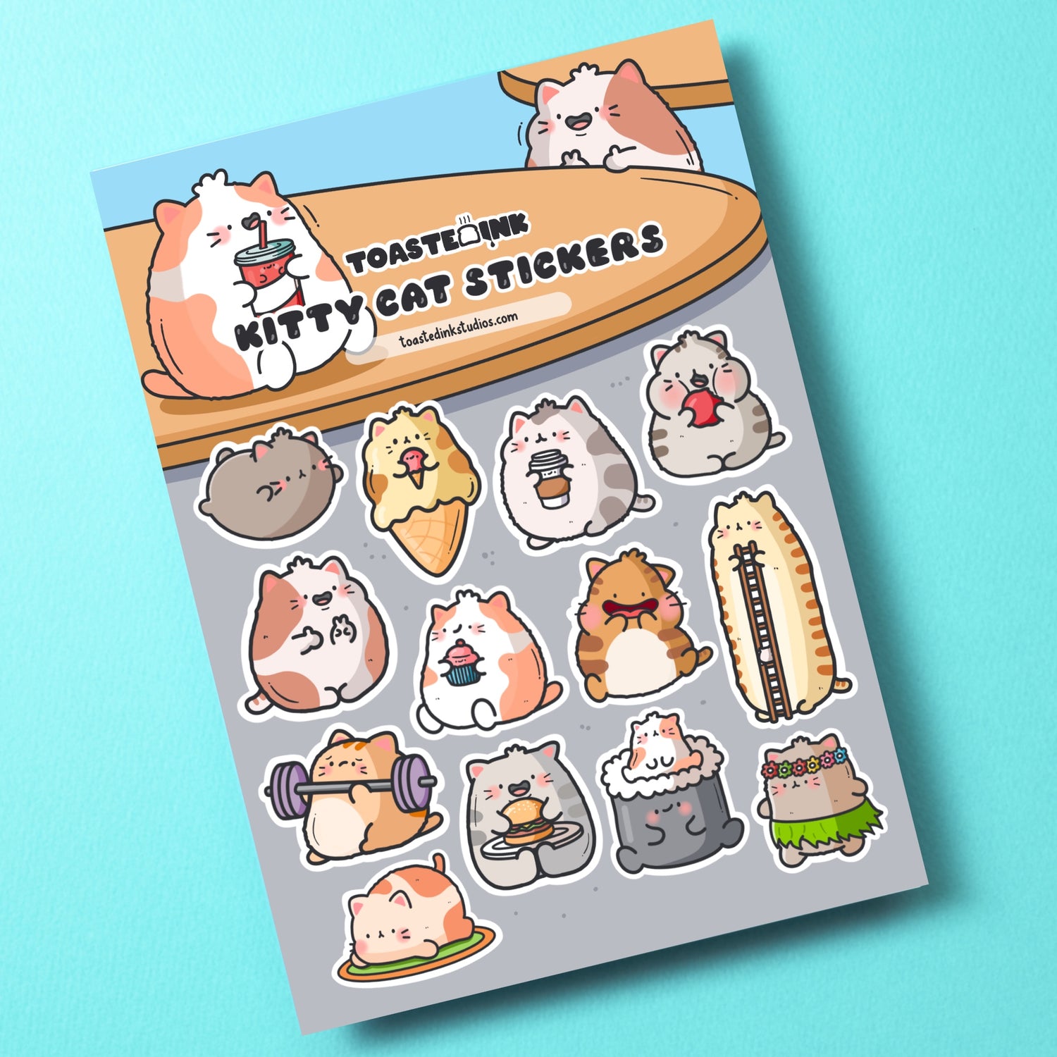 cat sticker sheet on green table