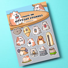 cat sticker sheet on green table