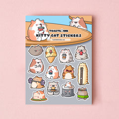 cat sticker sheet on pink table
