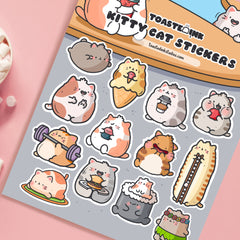 cat sticker sheet on pink table close up