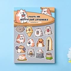 cat sticker sheet on blue table