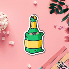 Champagne vinyl sticker on pink table