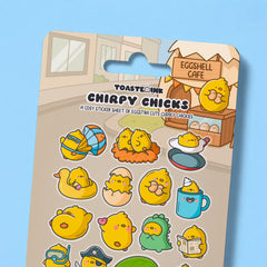 Close up of chick sticker sheet on blue desk