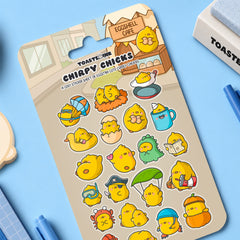 Chick sticker sheet on blue table with stationery