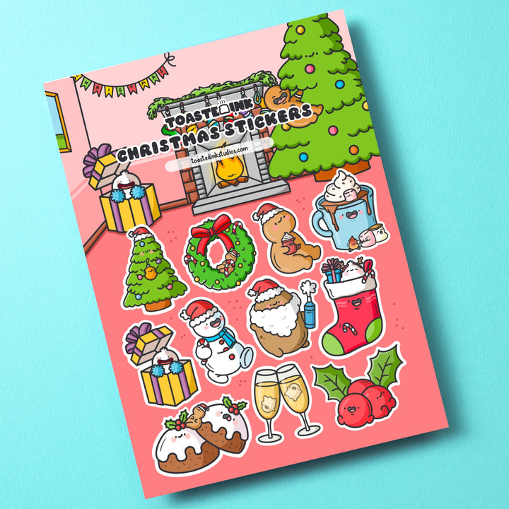 Christmas sticker sheet on green table