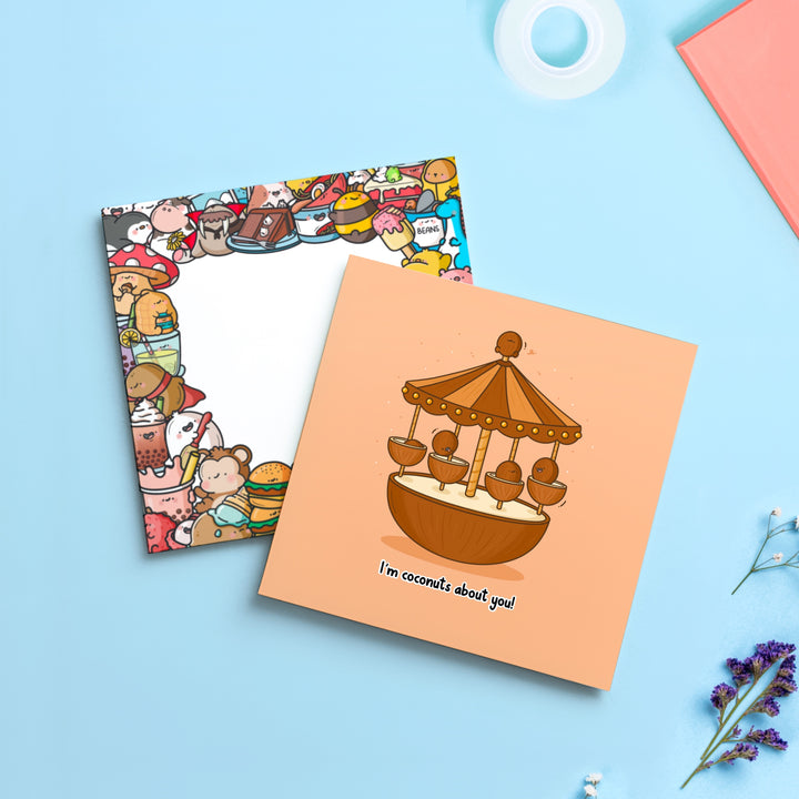 Coconut card with Toastedink envelope on blue table