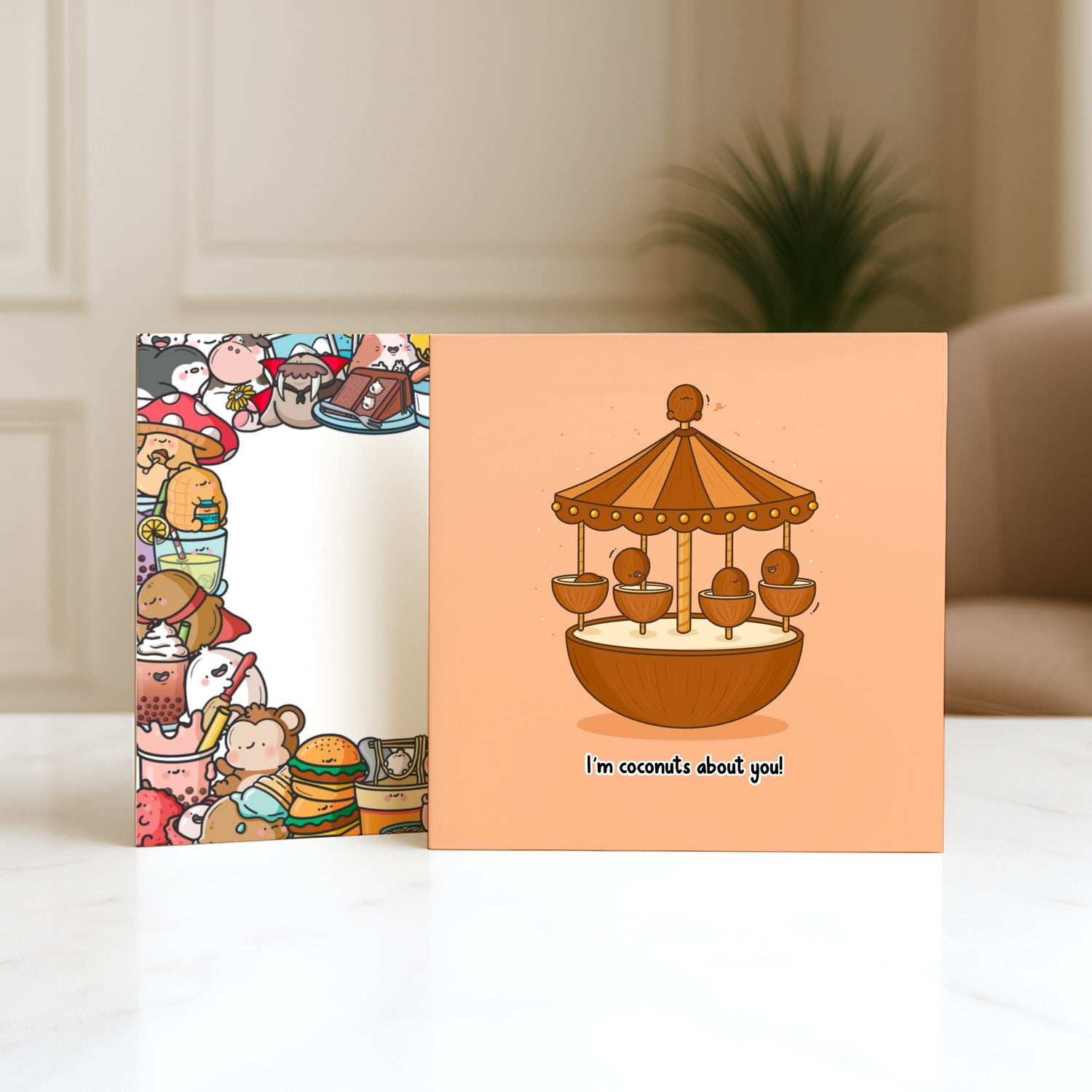 Coconut card with Toastedink envelope on marble table