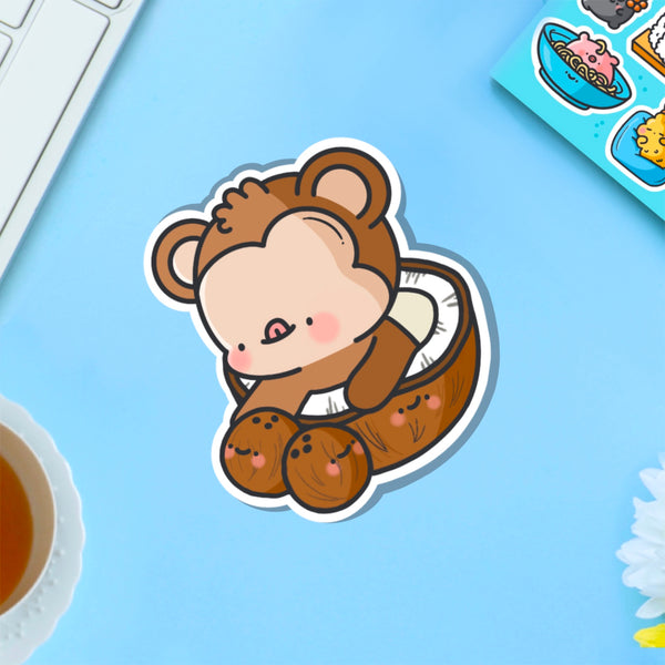 Monkey in a coconut vinyl sticker 