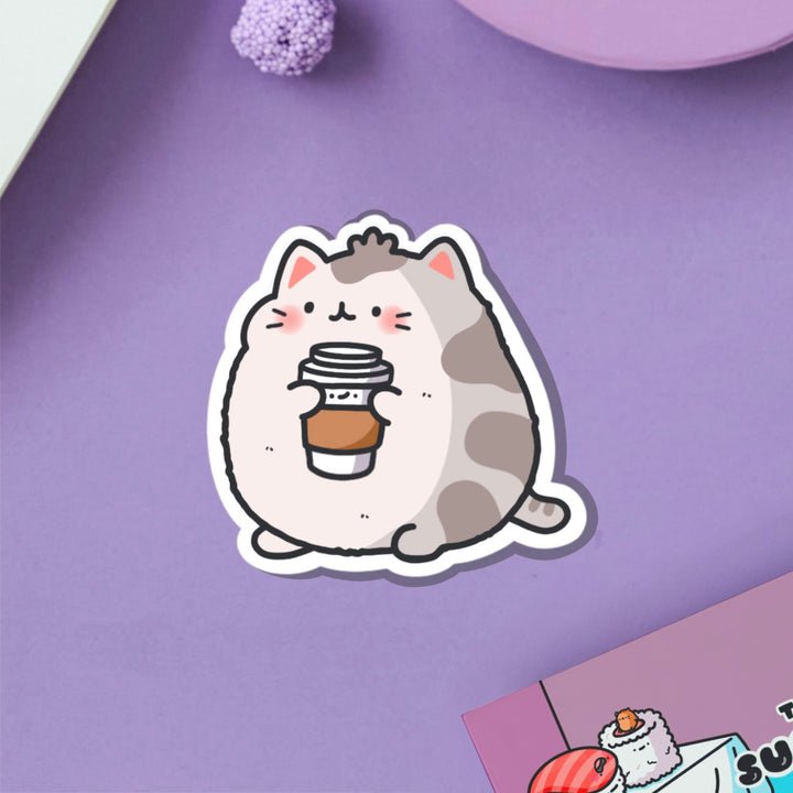 Coffee cat vinyl sticker on purple table