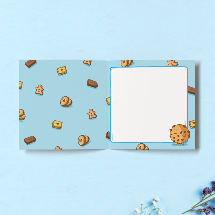 Cookie print inside card on blue table with flowers