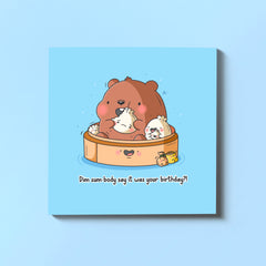 Dim sum bear birthday card on blue table