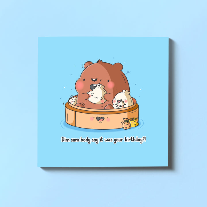 Dim sum bear birthday card on blue table