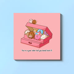 Donut card on blue table