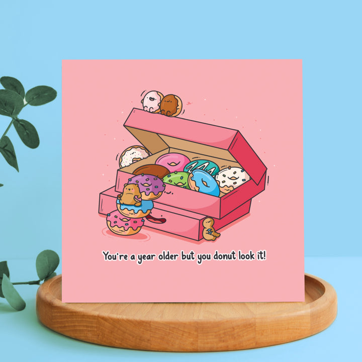 Donut card on wooden block