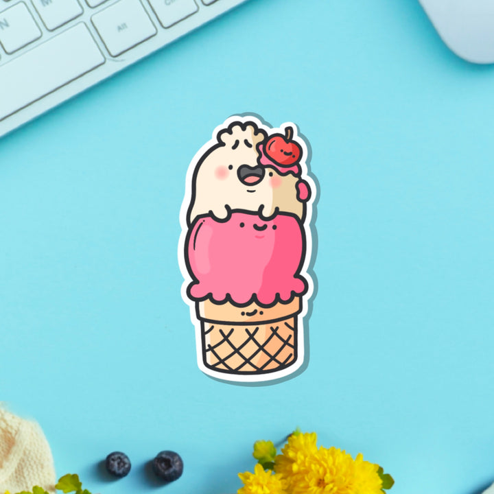 Dumpling ice cream vinyl sticker on blue table with keyboard