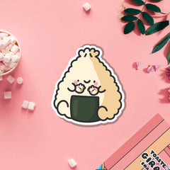 Dumpling sushi vinyl sticker on pink table