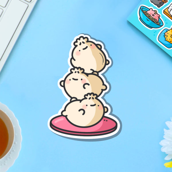 Dumpling stack vinyl sticker on blue table