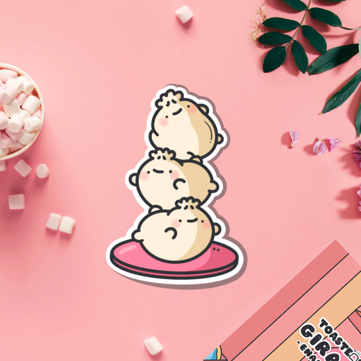 Dumpling stack vinyl sticker on pink table