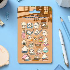 Dumpling sticker sheet with stationery scattered around