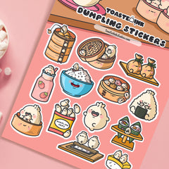 Dumpling stickers close up on pink desk