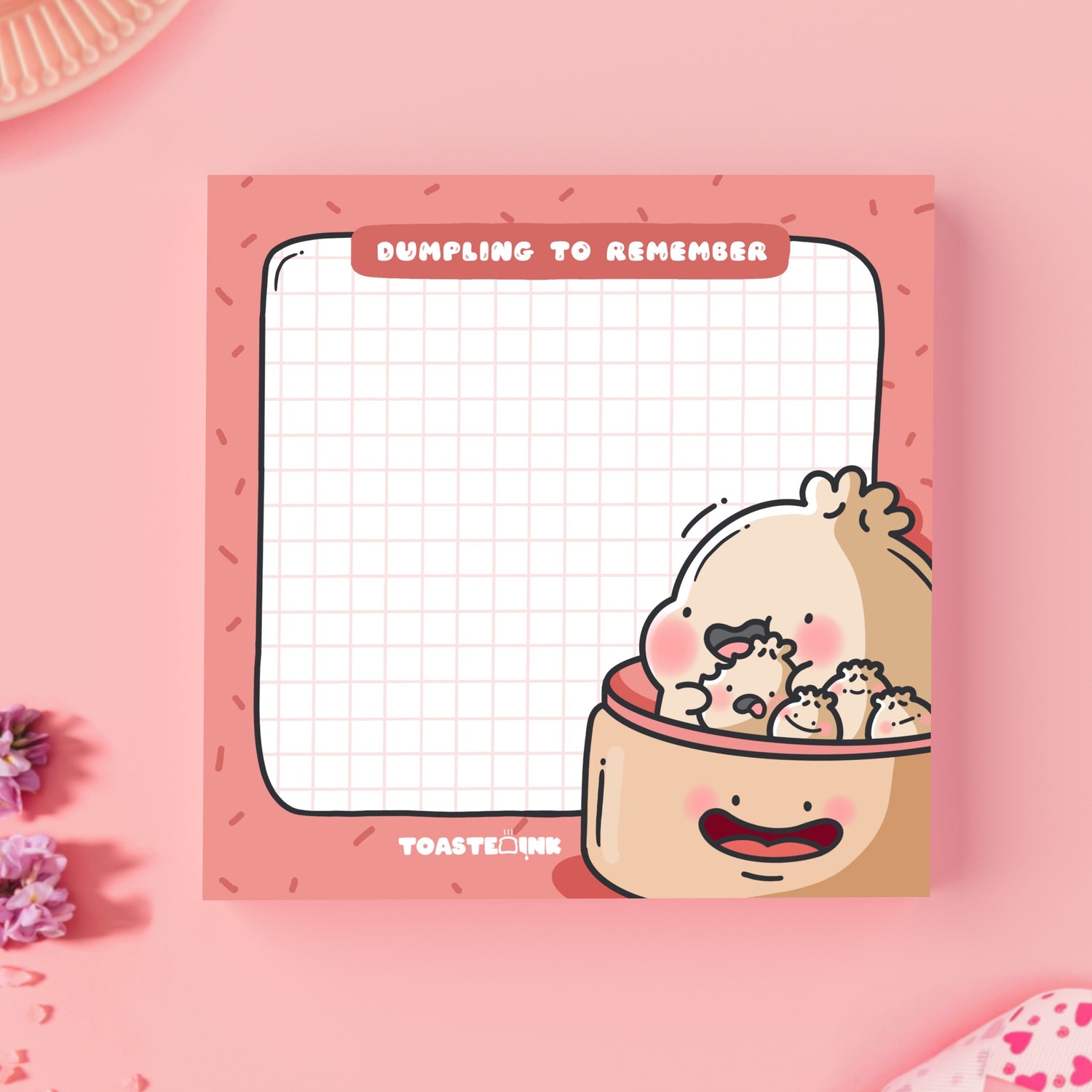 Dumpling sticky notes on pink desk