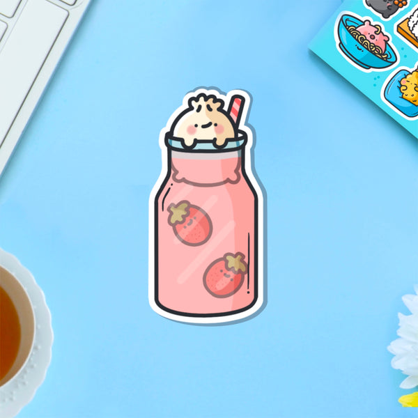 Dumpling in strawberry milkshake vinyl sticker on blue table