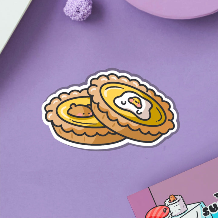 Egg tart vinyl sticker on purple table