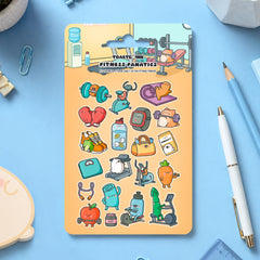 Fitness sticker sheet on blue table with modern stationery scattered