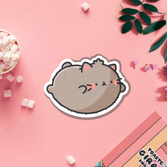 Flying cat vinyl sticker on pink table