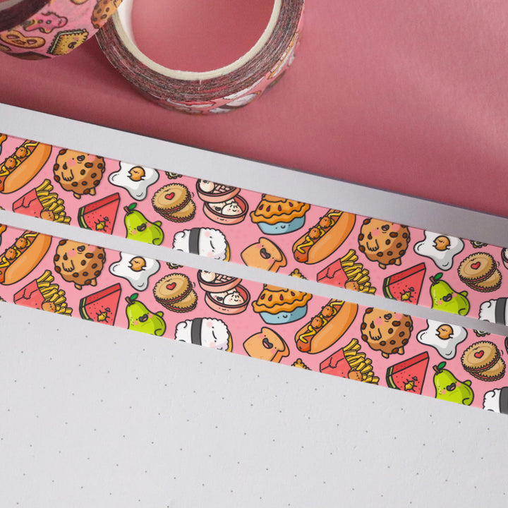 Food washi tape on notebook and pink table