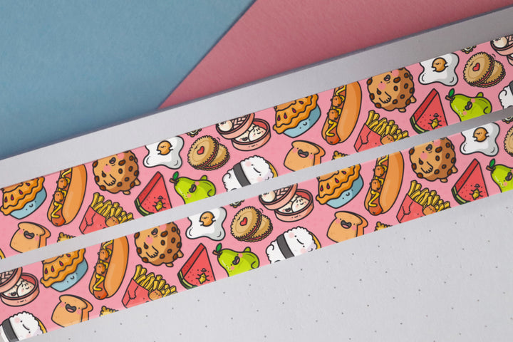 Food washi tape on notebook and blue and pink table