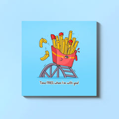 French fries on a rollercoaster card on blue table