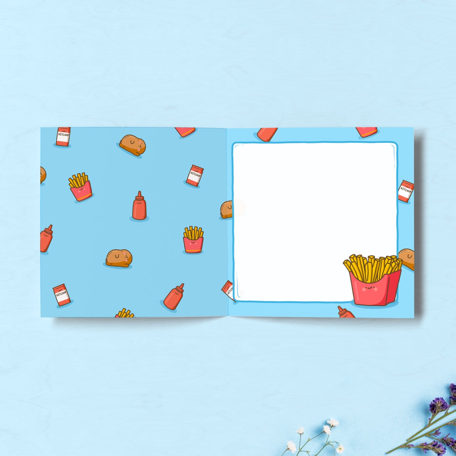 French fries print inside card on blue table