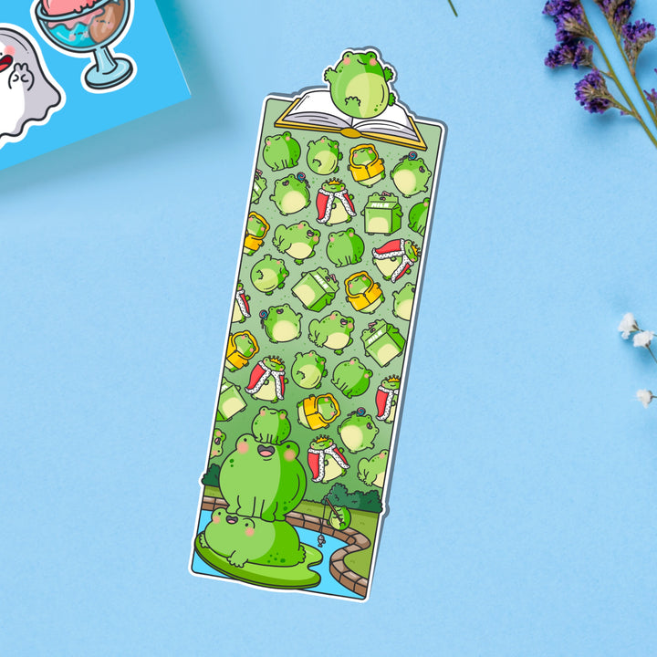 Frog bookmark on blue table with stickers