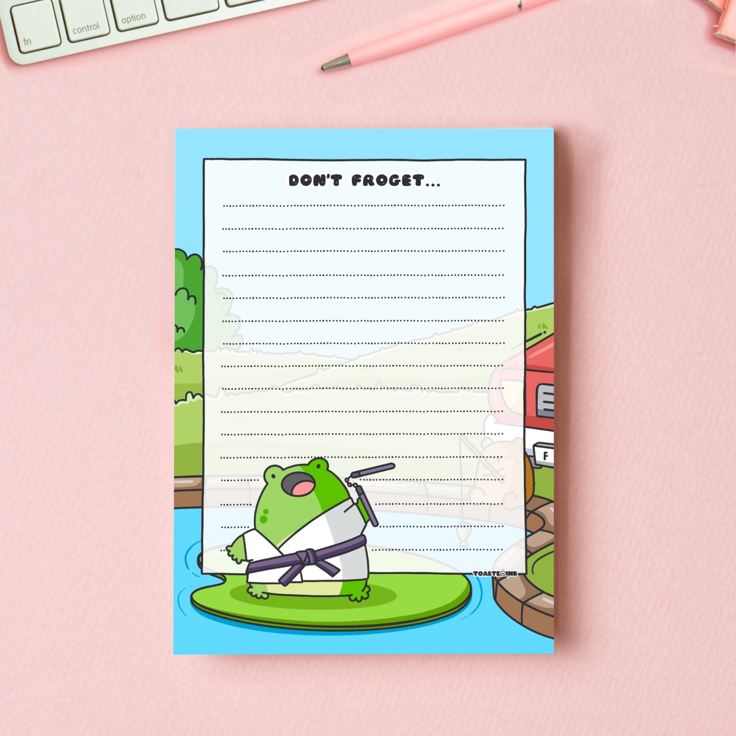 A6 frog notepad on pink desk