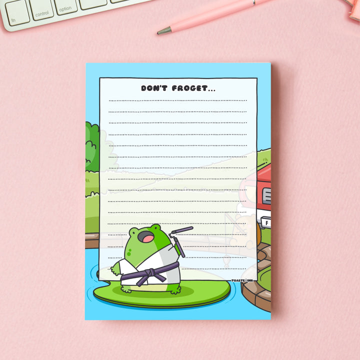 A6 frog notepad on pink desk