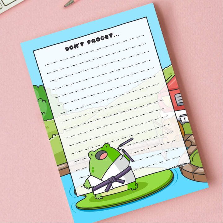 A6 frog notepad on pink table