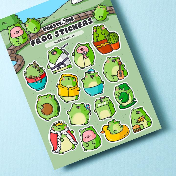 Frog sticker sheet on blue table