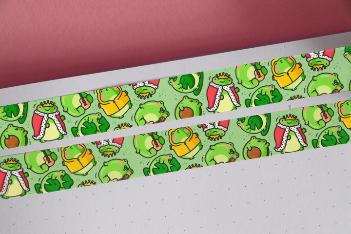 Green frog washi tape on pink table and notebook