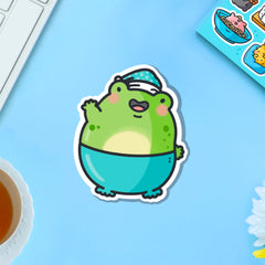Frog in pyjamas vinyl sticker on blue table