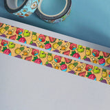 Fruit washi tape on notebook and blue desk
