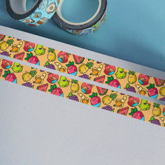 Fruit washi tape on notebook and blue desk