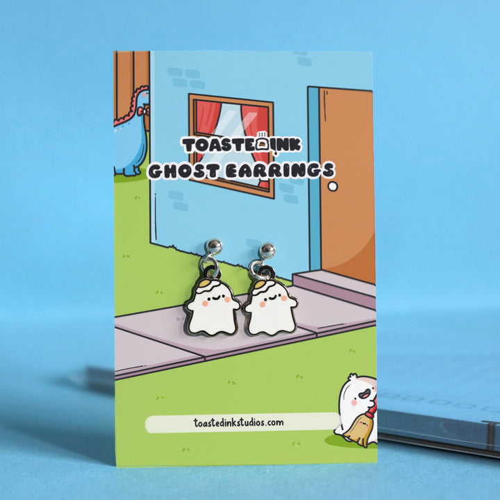 Ghost stud earrings on backing card