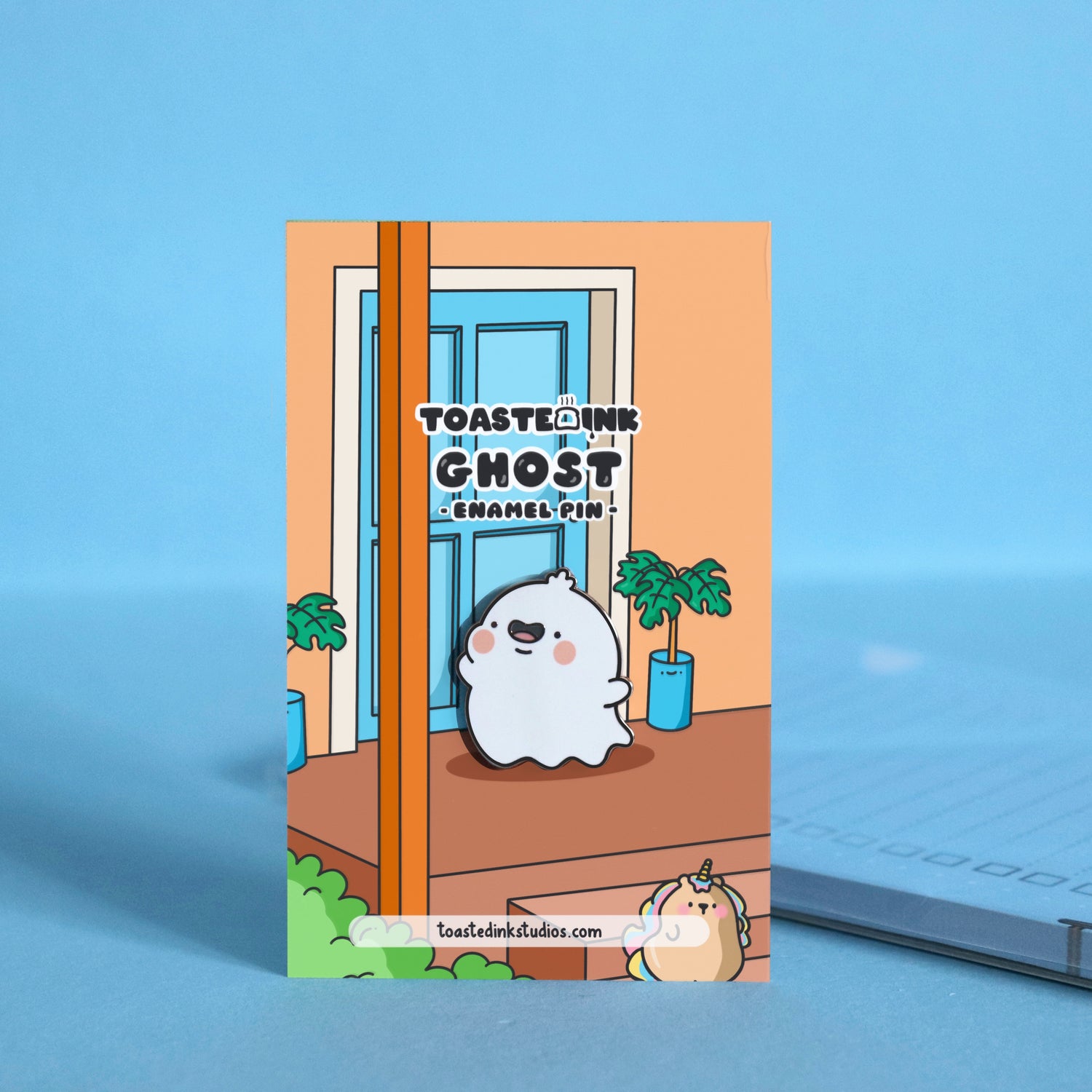 Ghost enamel pin on backing card