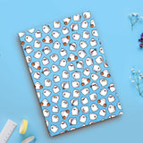 Ghost Notebook on blue table