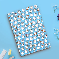 Ghost Notebook on blue table